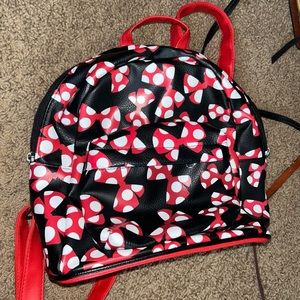 A mini Disney book bag.